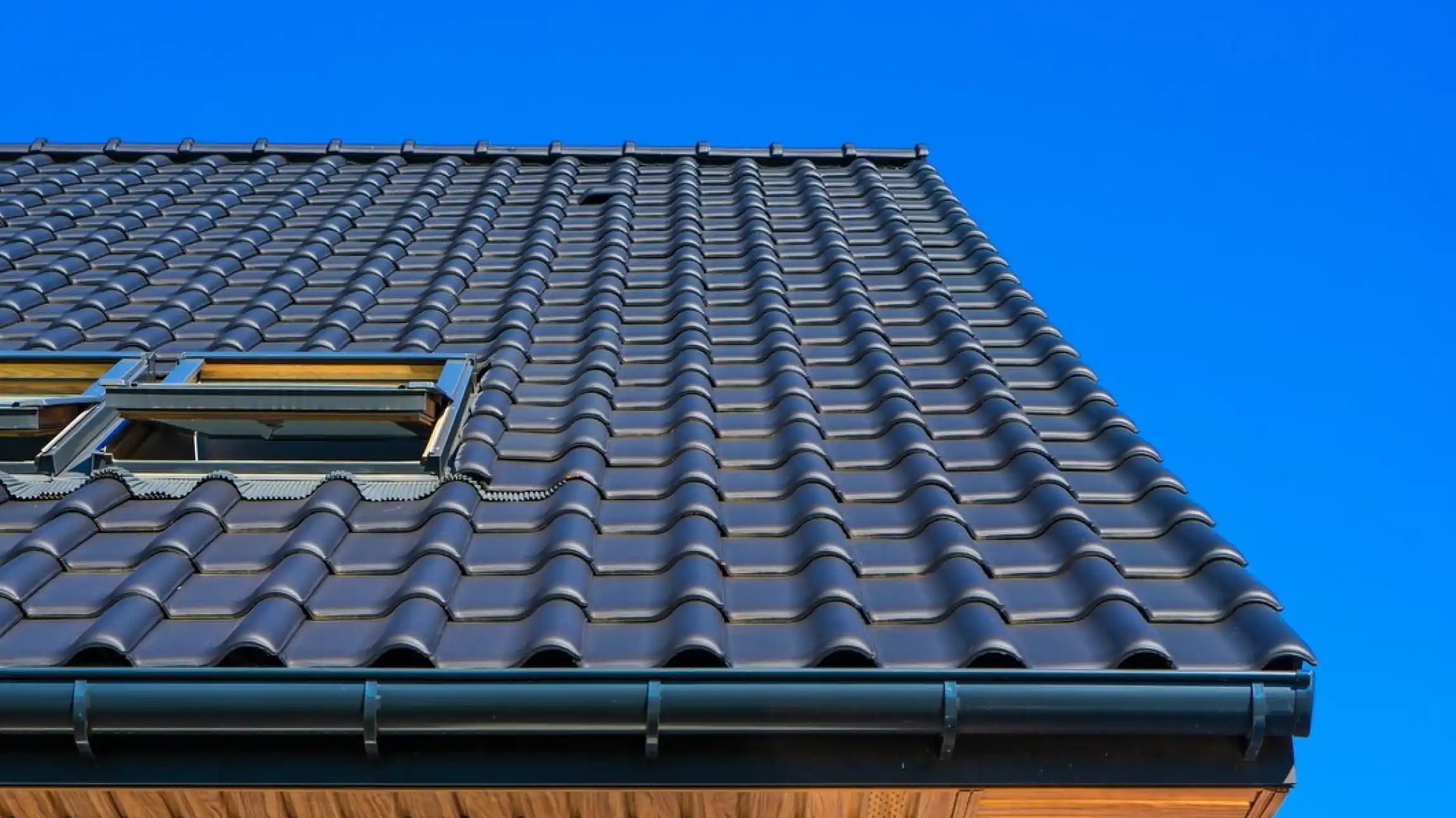 Seamless gutters for Houston homes protecting roofs and enhancing durability